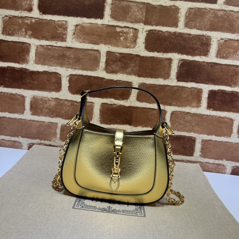 G*u*i top handle bags